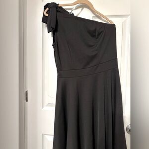 Black one shoulder cocktail dress.